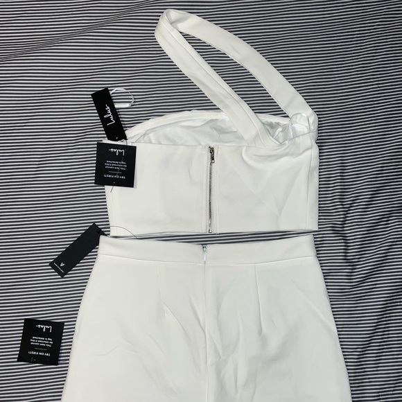 Lulus Pants - You will want to show off in this Lulus Jumpsuit